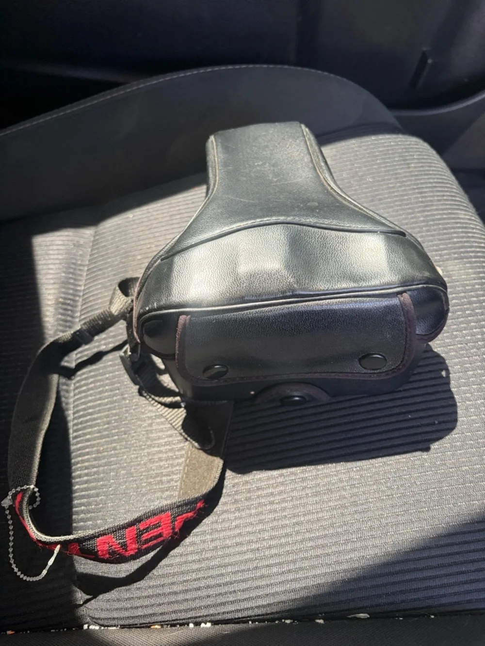 Pentax Black SLR Camera with Telephoto Lens